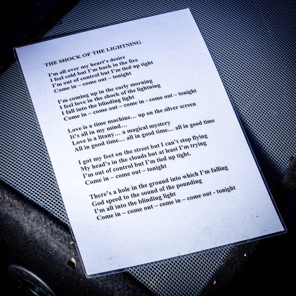 2000s Oasis The Shock of the Lightning A3 Laminated Lyrics